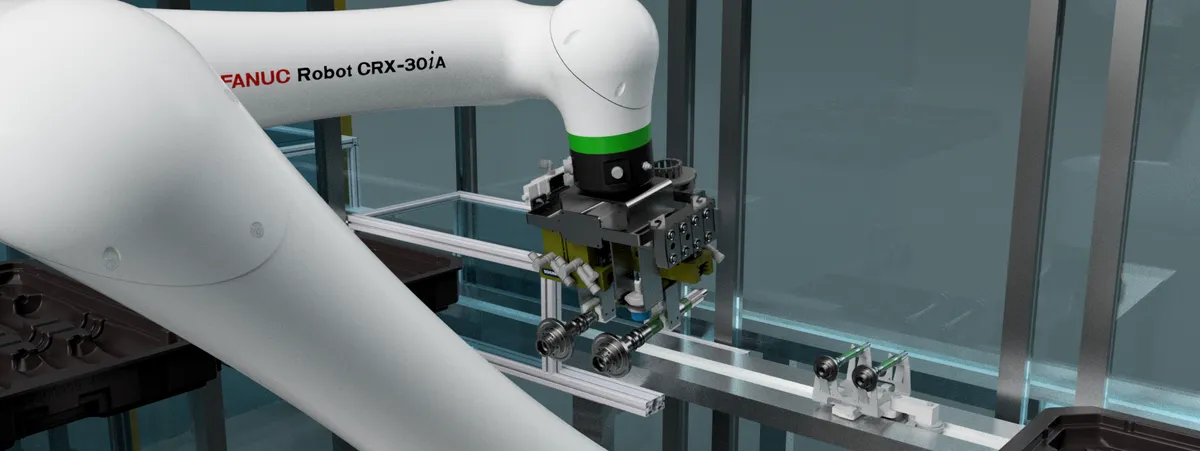 Robot plaatst een onderdeel in een machine
